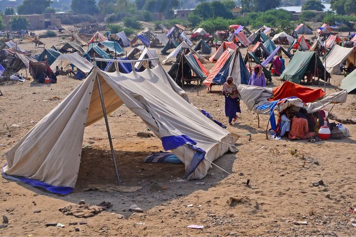 Internally displaced flood-affected people take refuge at a makeshift camp in Dadu district of Sindh province on Wednesday.