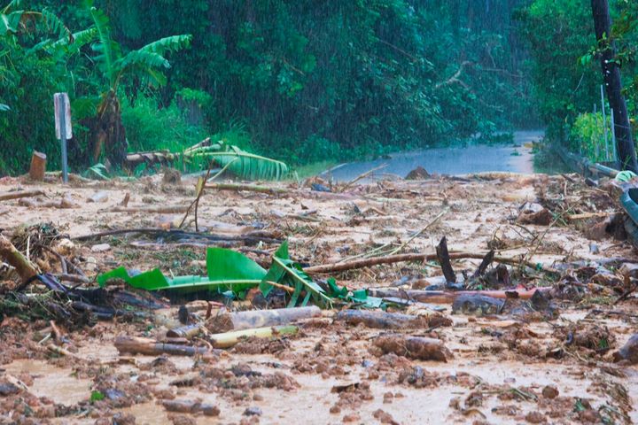 A road is blocked by a mudslide caused by Hurricane Fiona in Cayey, Puerto Rico, on Sunday.